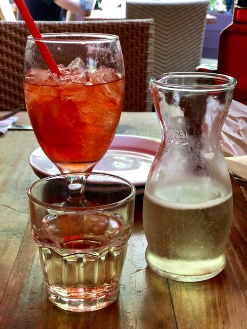 Venetian-style Spritzer Della Casa: prosecco with special house-blended bitters and fresh orange ($12
