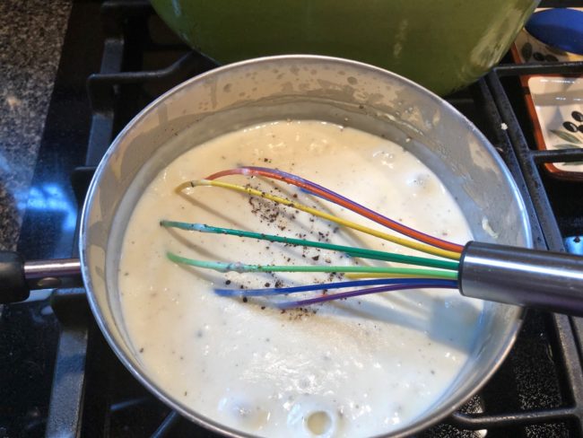 Whisk Melted Butter for Ham and Cheese Potato Soup