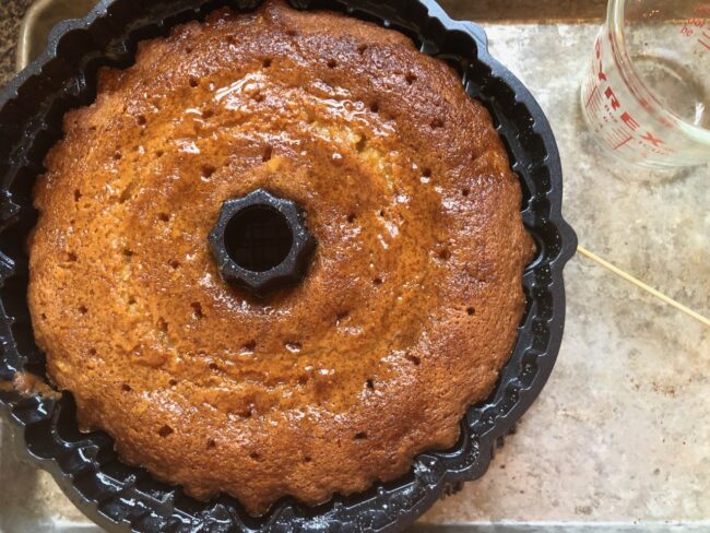 citrus olive oil bundt cake with drizzled syrup on top