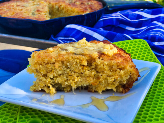 Slice of Skillet Hatch Chile Cornbread with Hatch Chile Honey Butter