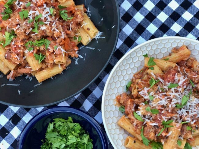 Rigatoni with sausage and fennel plates garnished