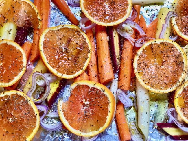 Orange rings over the roasted carrot ingredients