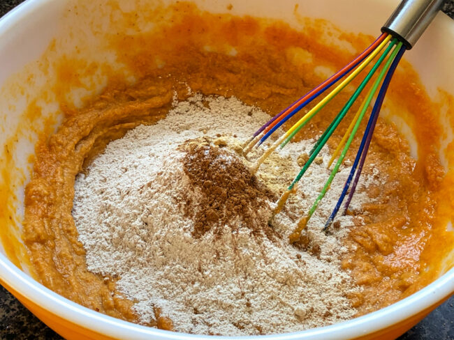 whisking flour, cinnamon, ginger, and salt together